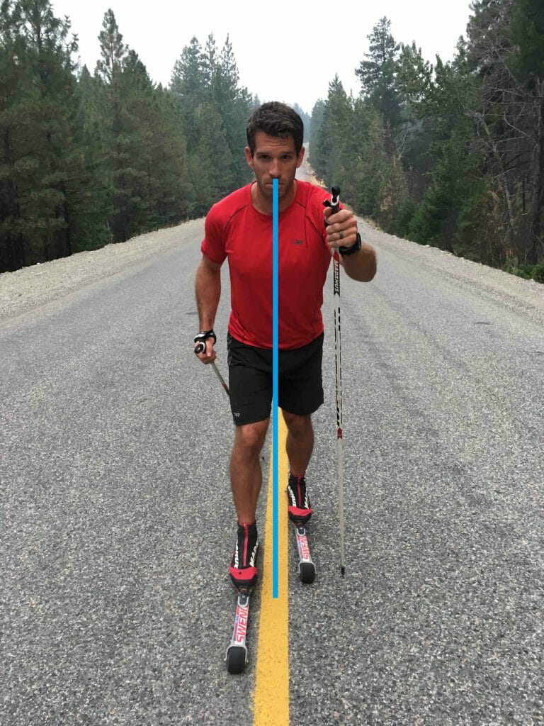Note the inadequate weight shift in this photo. The skiers center of gravity is in between the skis, making it much more difficult to powerfully drive the front ski forward or attain strong grip with the skin he's going to be weighting.